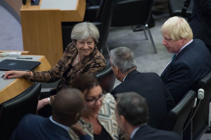 Foreign Secretary Boris Johnson (right) and Prime Minister Theresa May attend a meeting at the United Nations General Assembly 
