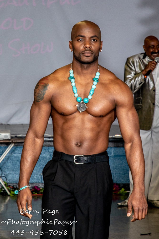 A model walks in Alyscia Cunningham's "I Am More Than My Hair" fashion show.