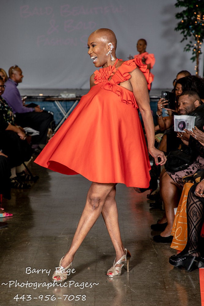 A model walks in Alyscia Cunningham's "I Am More Than My Hair" fashion show.