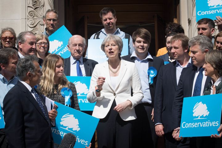Theresa May celebrates the Tories retaining Wandsworth in London