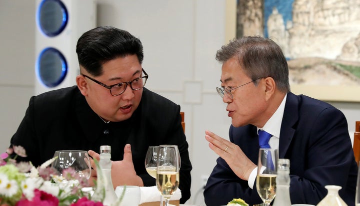 South Korean President Moon Jae-in and North Korean leader Kim Jong Un attend a banquet on the Peace House at the truce village of Panmunjom inside the demilitarized zone separating the two Koreas, South Korea, April 27, 2018.