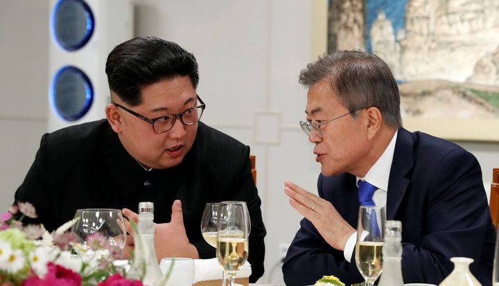 South Korean President Moon Jae-in and North Korean leader Kim Jong Un attend a banquet on the Peace House at the truce village of Panmunjom inside the demilitarized zone separating the two Koreas, South Korea, April 27, 2018. 