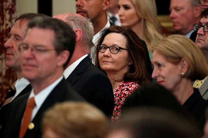 Gina Haspel, center, is facing questions about her role in the CIA's past use of torture as the Senate now considers her nomination to lead the agency.