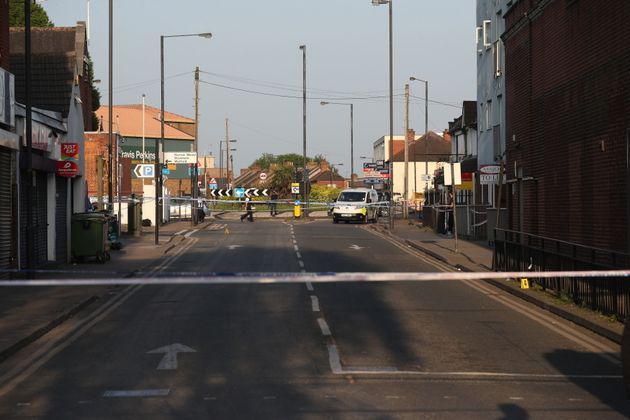 Police at Palmerston Road, in Wealdstone, in north west London, after two boys, aged 12 and 15, were shot at two locations in close proximity.