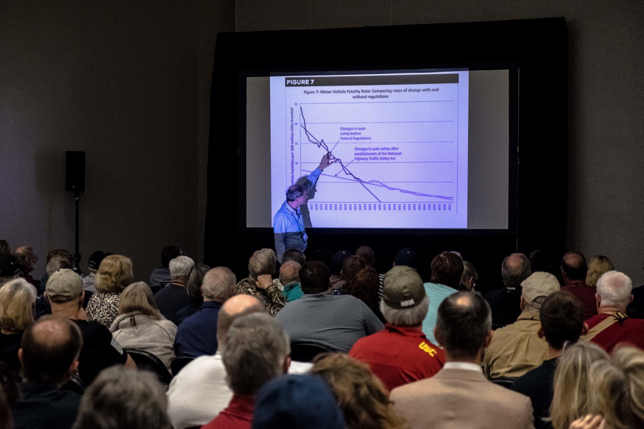 Economist and author John Lott Jr. addresses attendees of "The War on Guns" seminar at the NRA annual meeting on May 6.