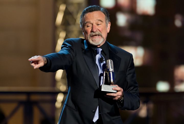 Robin Williams, accepting a comedy award in 2012. According to a new biography, he cried uncontrollably during filming of 2014’s “Night at the Museum: Secret of the Tomb.”