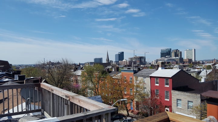 The view of downtown Baltimore from the roof of Jeannette Belliveau’s historic townhouse, which she rents to short-term guests.