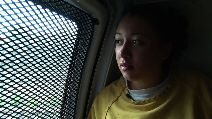 Cyntoia Brown, now 30, has served 13 years in prison for a 2004 murder. Here she's seen riding to the courthouse during her criminal trial in 2006, in a scene from the documentary "Me Facing Life: Cyntoia’s Story."