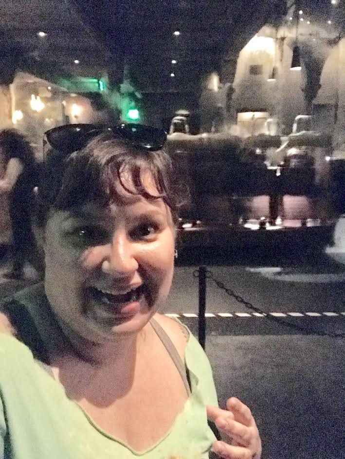 Jana Schmieding stands in front of the Harry Potter and the Forbidden Journey ride at Universal Studios in California.