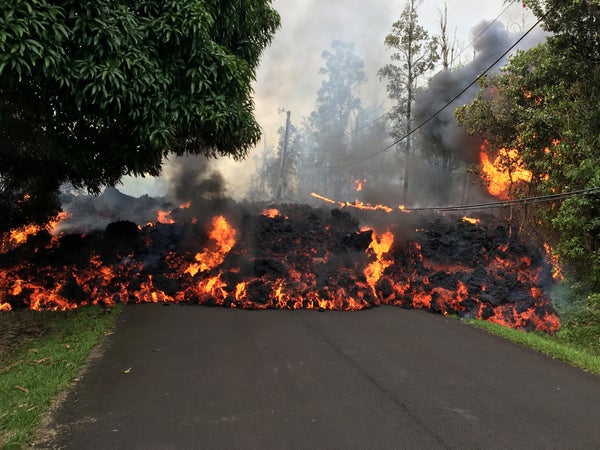 Lava engulfing homes