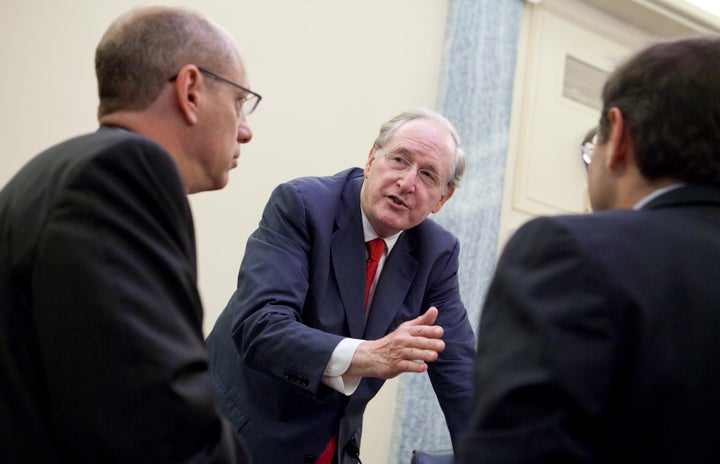 Then-Sen. Jay Rockefeller (center) talks to FTC chairman Jon Leibowitz, left, and FCC chairman Julius Genachowski (right