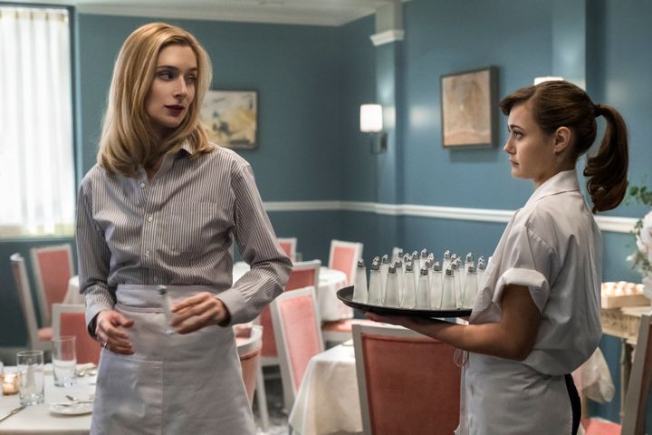 Caitlin FitzGerald as Simone teaches Tess the finer side of restaurant work.
