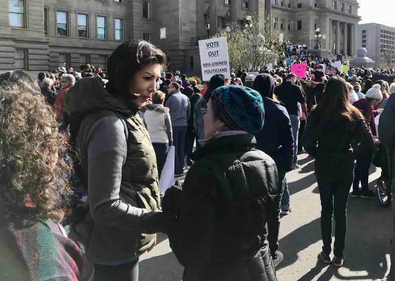 Jordan listens to women during the Women's March outside the Idaho Capitol in March 2018.