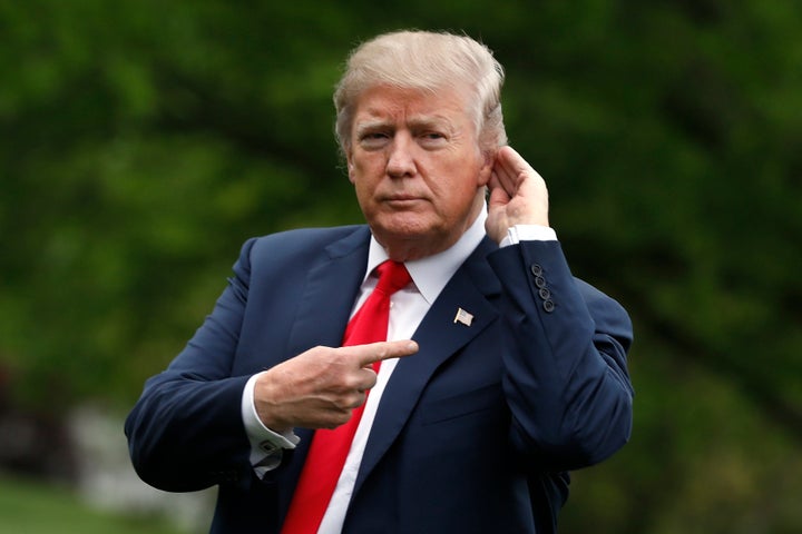 President Donald Trump on the South Lawn as he returns to the White House from Cleveland on Friday. The White House is set to propose two huge sets of spending cuts.