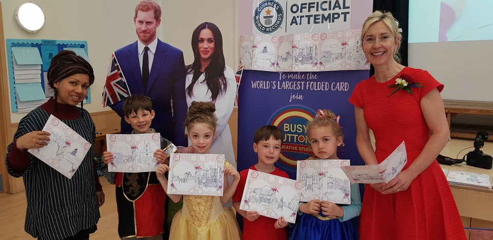 Pupils at Upton House School dressed up as princes, princesses or in red, white or blue. They all took part in the Guinness World Record Attempt to create the longest card for the couple. 