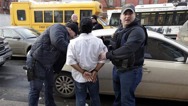 <p>Immigration and Customs Enforcement officers make an arrest in New York.</p>