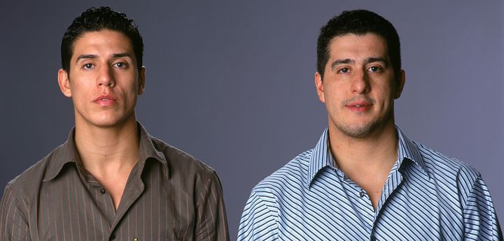 Taekwondo athlete Steven Lopez (left) poses with brother and coach Jean Lopez during the U.S. Olympic Team Media Summit on May 16, 2004. Both brothers have been accused of sexual misconduct.