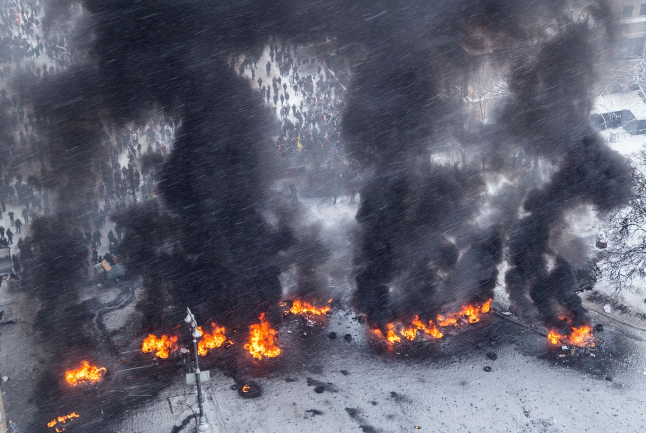 <strong>Smoke from burning tyres set ablaze during the very cold Ukrainian Revolution in 2014.</strong>