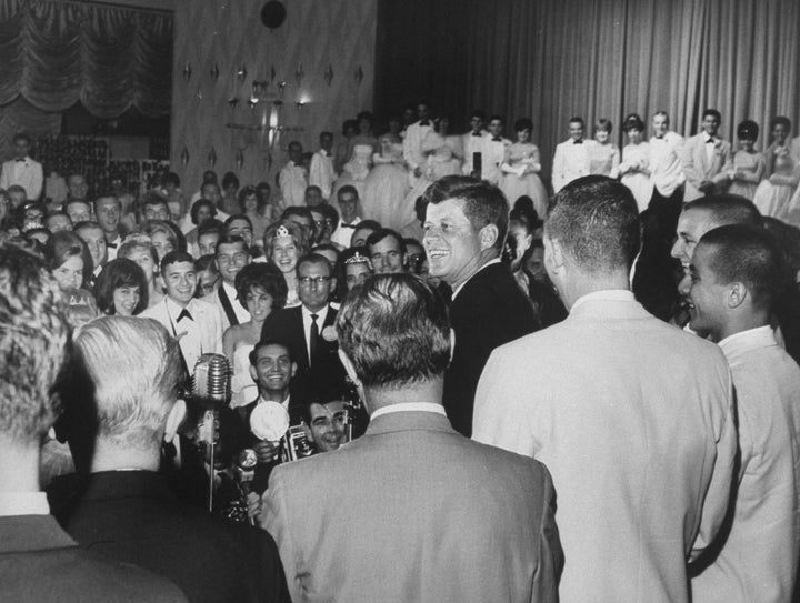 President John F. Kennedy visits students at the 1963 John Burroughs High School prom.