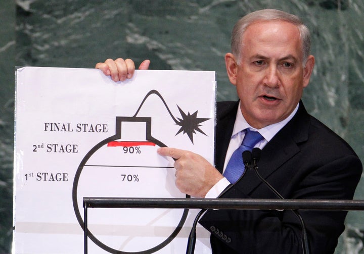 Israeli Prime Minister Benjamin Netanyahu points to a red line he drew on the graphic of a bomb used to represent Iran's nuclear program as he addresses the United Nations General Assembly on Sept. 27, 2012.