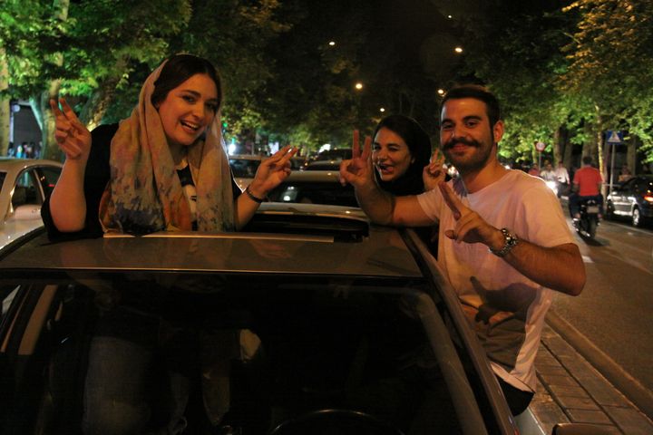 Iranian people celebrate the nuclear agreement between Iran and the P5+1 world powers on July 14, 2015 in Tehran, Iran.