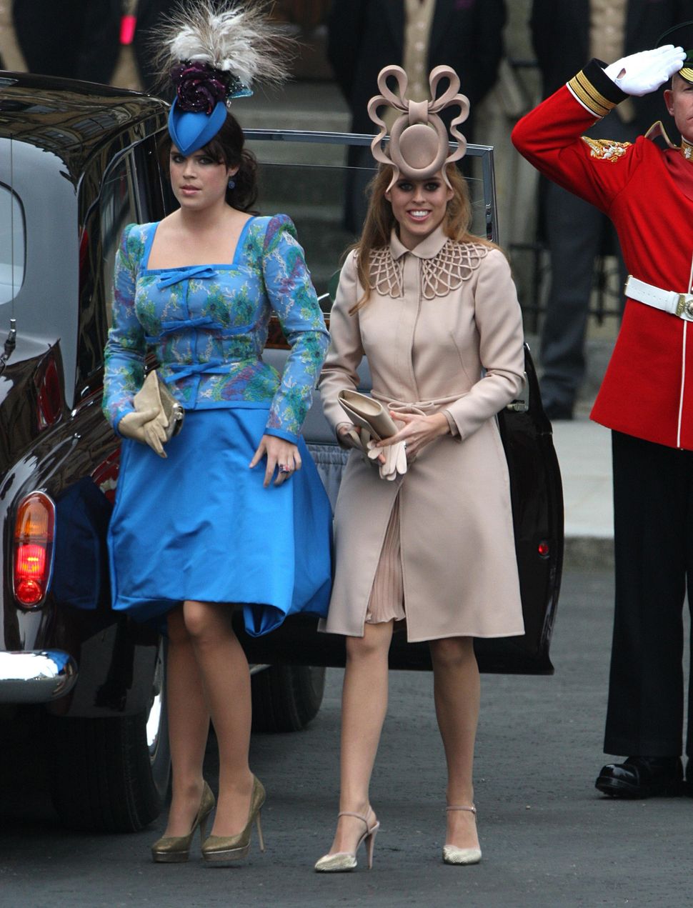 Princesses Beatrice (right) and Eugenie stole the show and William and Kate's 2011 wedding with their extravagant head-gear 