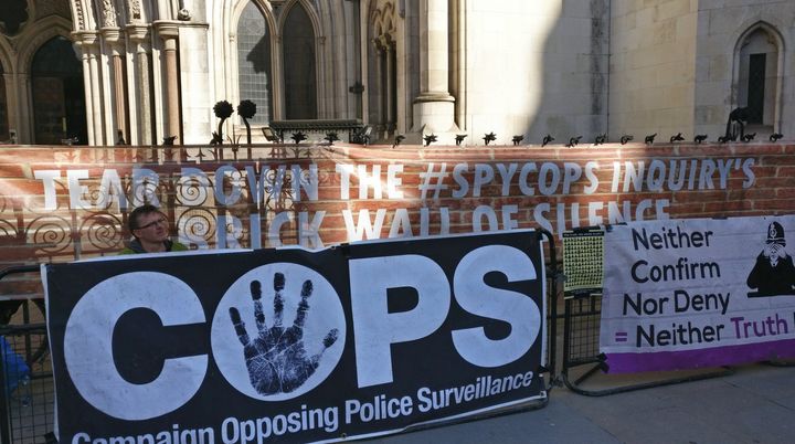 Police Spies Out protesters outside the Royal Court of Justice in Wednesday