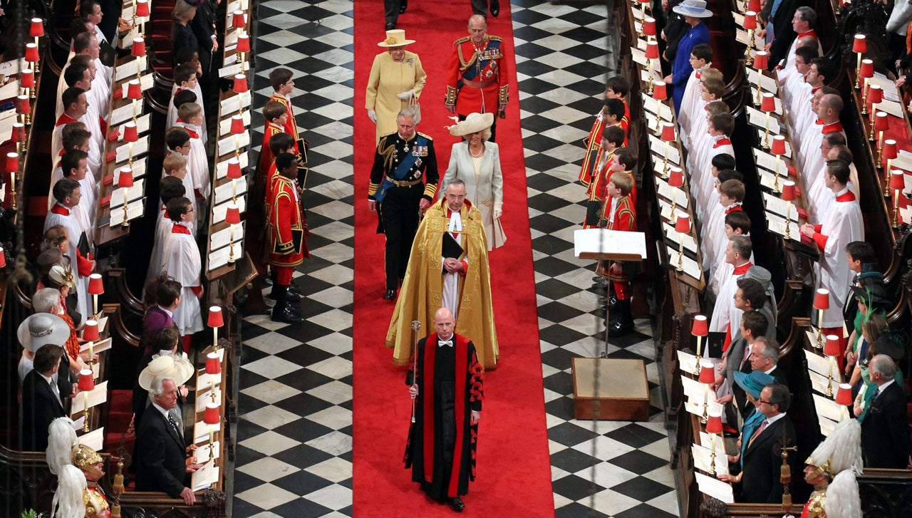 Guests were asked to stand as the Queen arrived at the Duke and Duchess of Cambridge's wedding in 2011 