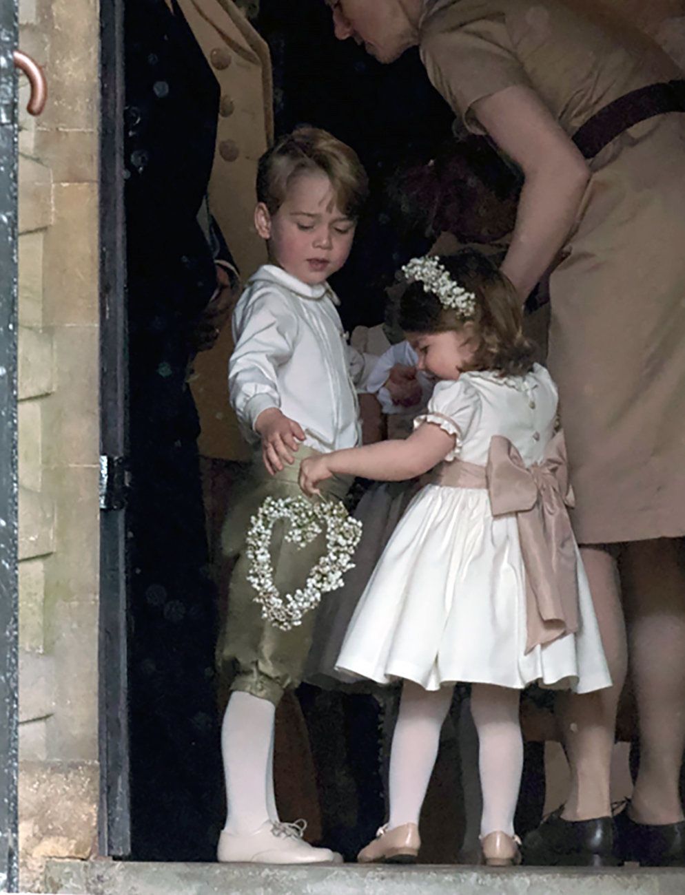 Prince George and his younger sister Princess Charlotte - pictured at Pippa Middleton's wedding - are expected to be pageboy and bridesmaid for their uncle Harry 