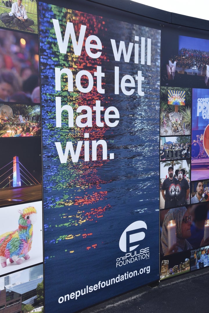 The temporary memorial includes interactive wall exhibits, lighted benches and a steel fence where visito