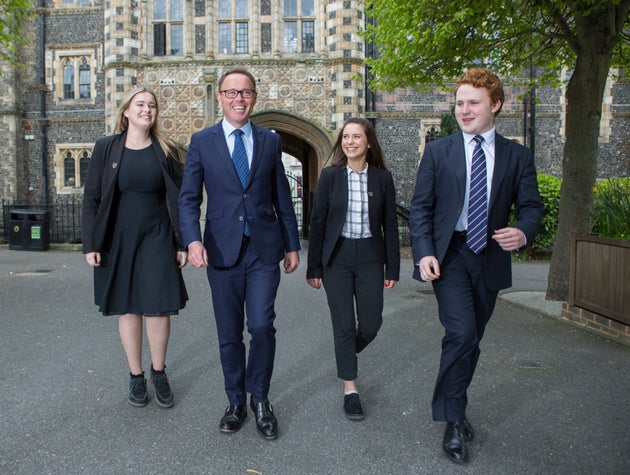 Mr Cairns and pupils at Brighton College.