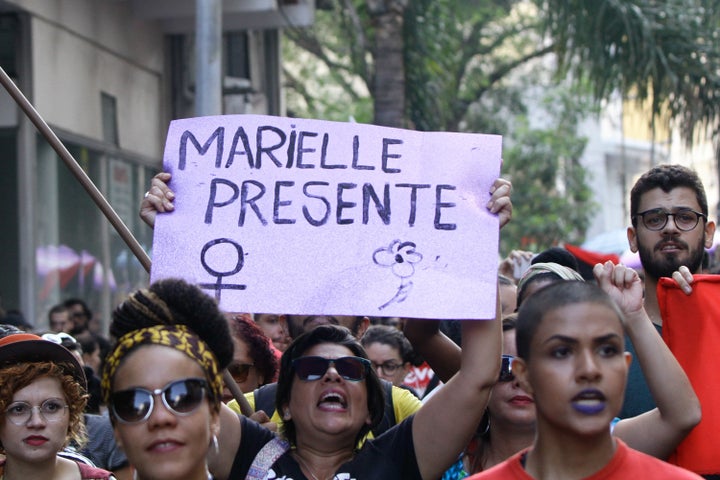 "Marielle Presente" -- or "Marielle Is Present" -- became a rallying cry for protesters around the world after Franco's murder. 