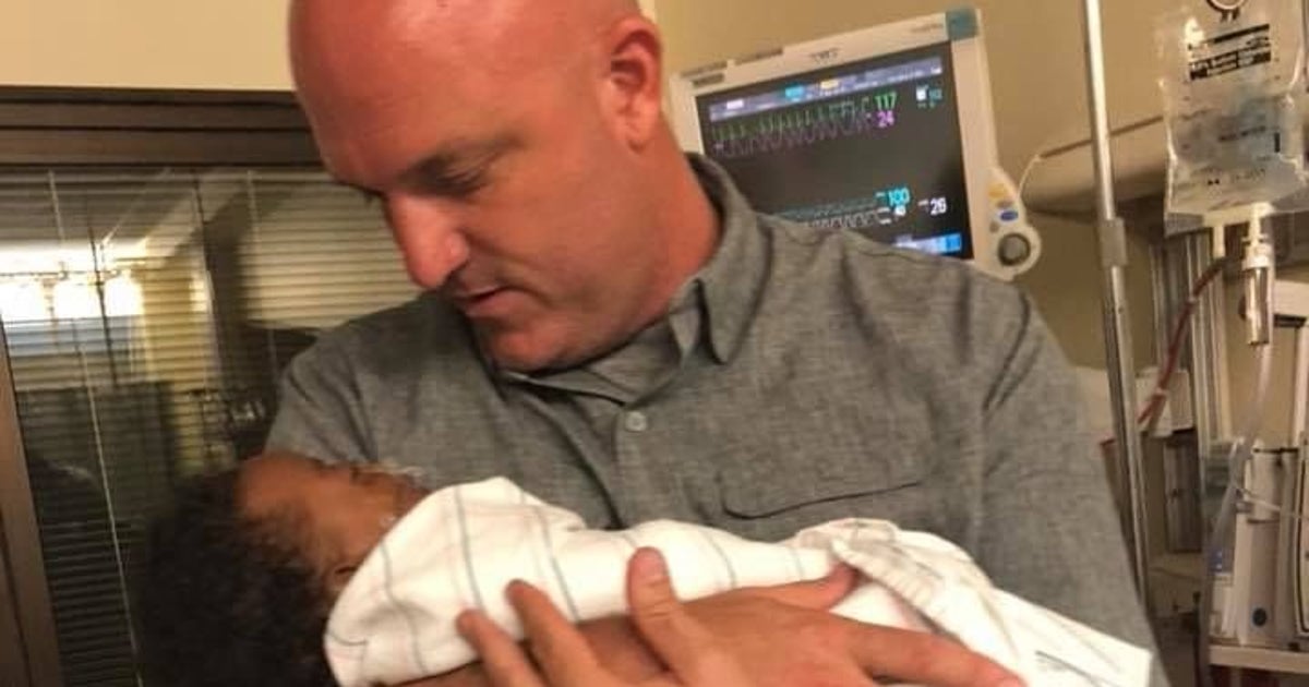 Watch The Moment Hero Officer Helps Save Baby's Life At The Side Of The ...