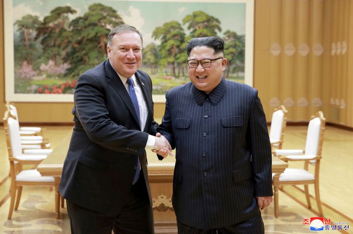 North Korean leader Kim Jong Un shakes hands with U.S. Secretary of State Mike Pompeo in this May 9 photo by North Korea's Korean Central News Agency in Pyongyang.