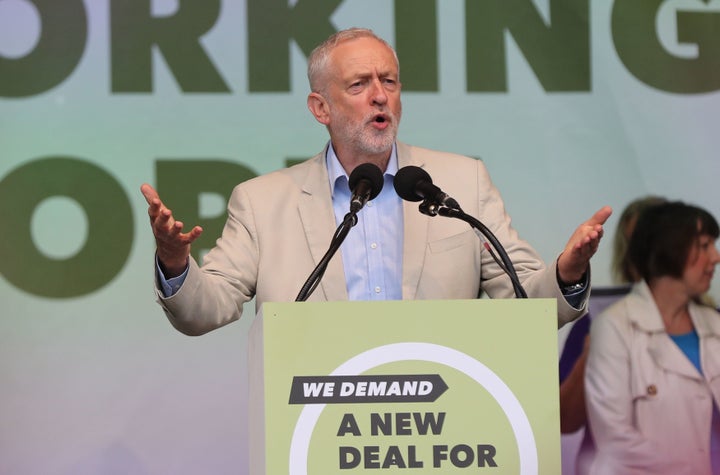 Labour leader Jeremy Corbyn speaks to demonstrators during a TUC rally in central London, as part of its 'great jobs' campaign.