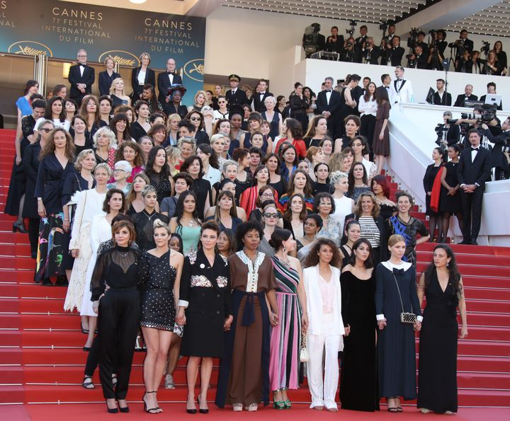 The 82 women, led by Cate Blanchett, stand in protest on the steps of the Palais des Festivals at Cannes on Saturday.