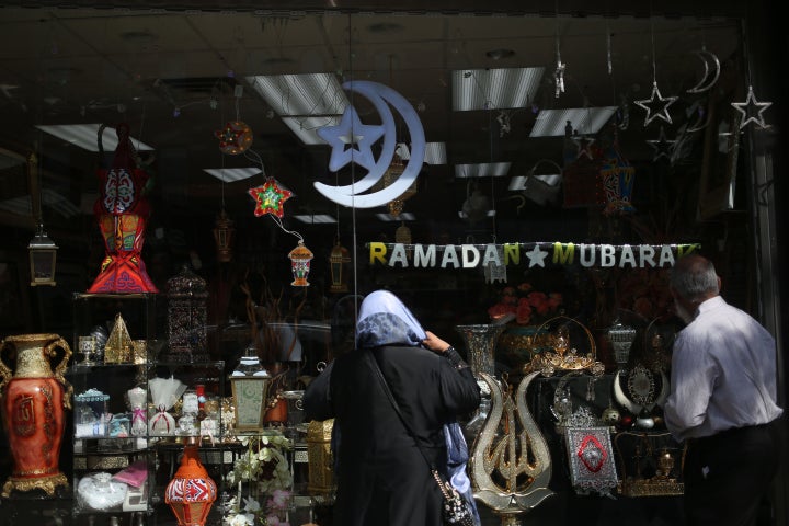 A couple looks at Ramadan decorations in the Bayridge neighborhood of Brooklyn, New York, on May 14, 2018.