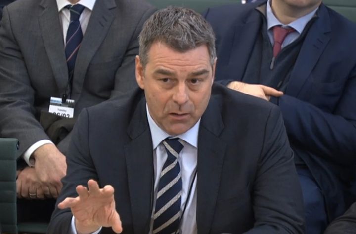 Richard Howson, former Chief Executive, answering questions at a joint hearing of the Commons Business, Energy and Industrial Strategy Committee and the Work and Pensions Committee at Portcullis House in London