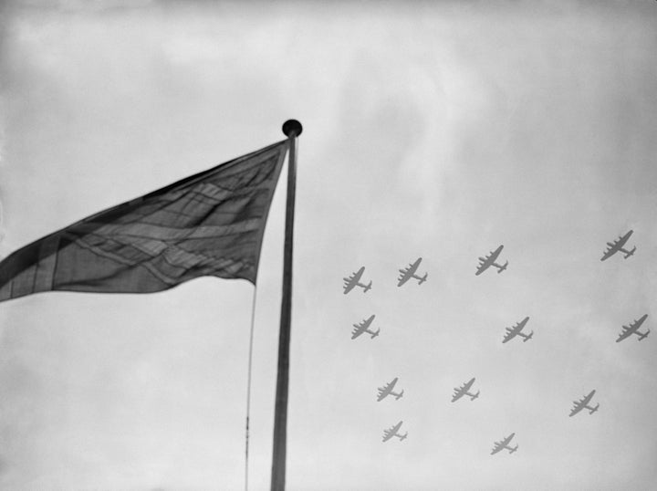 Lancaster Bombers flying in formation over the Union Jack in 1946 