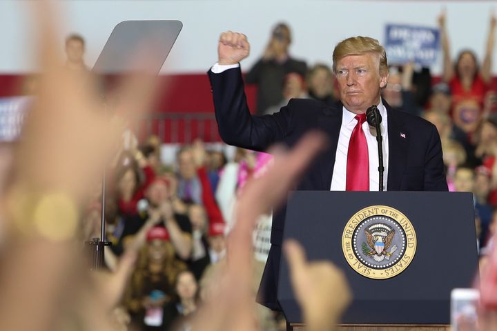 President Donald Trump addresses his supporters during a campaign rally in Washington Township, Michigan, on April 28.