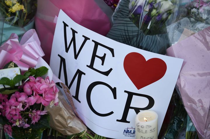 Messages of support and floral tributes were placed outside the Manchester Arena after the attack.