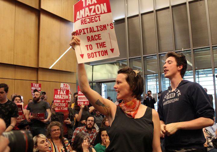 People protesting on May 14 during a Seattle City Council vote on a new "head tax" on big businesses in the city to help fund homelessness services. Amazon campaigned strongly against the tax.