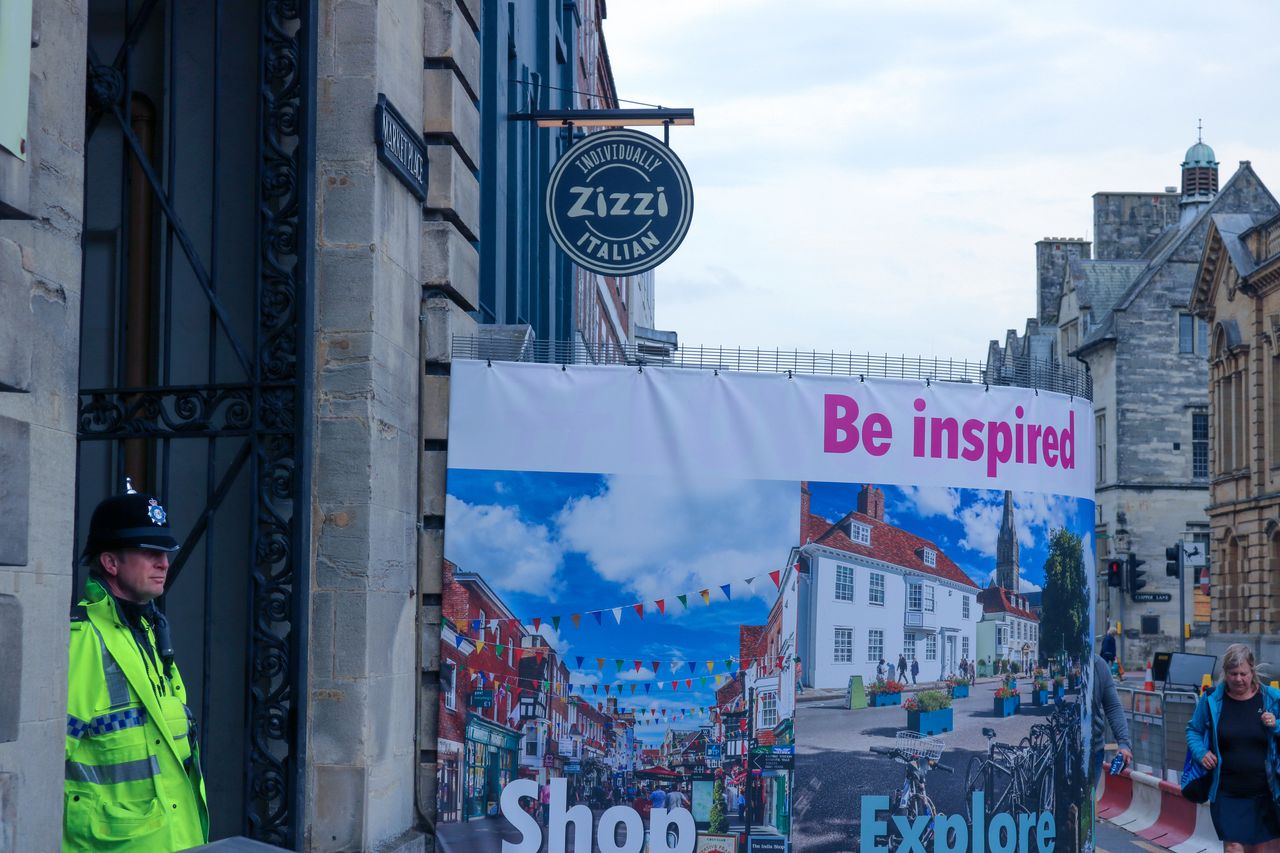 Zizzi's restaurant, where the Skripals dined just before they collapsed, has been cordoned off with promotional posters describing Salisbury as a place to 'be inspired'.