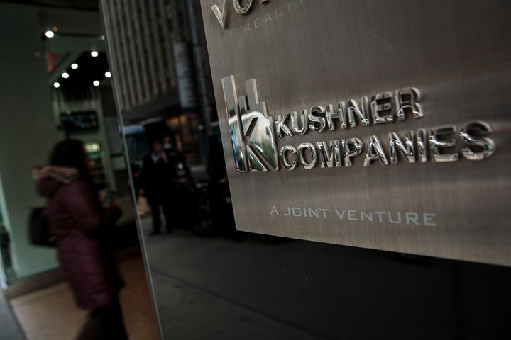 The Kushner Companies logo near the entrance to 666 Fifth Avenue.
