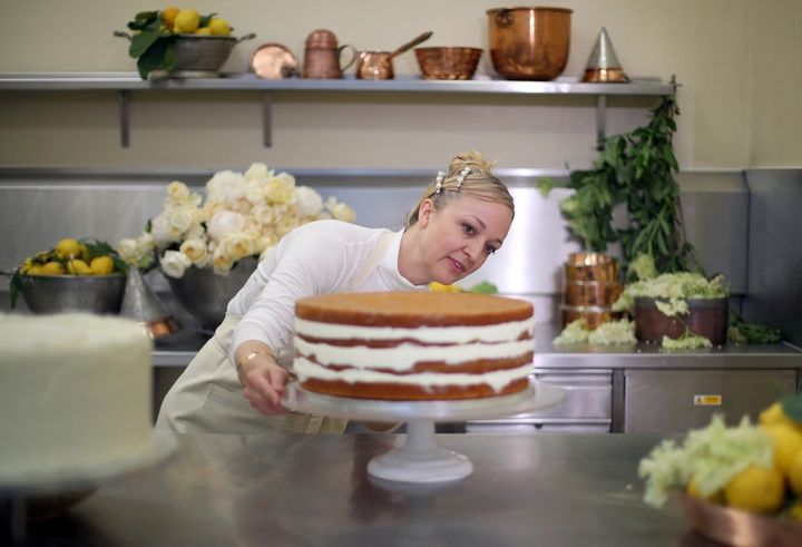Claire Ptak adds finishing touches to the cake for the royal wedding.