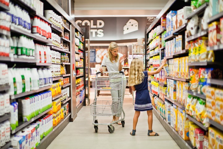 We chatted with a registered dietitian nutritionist who said pricier items are often stocked at eye level in grocery stores. 