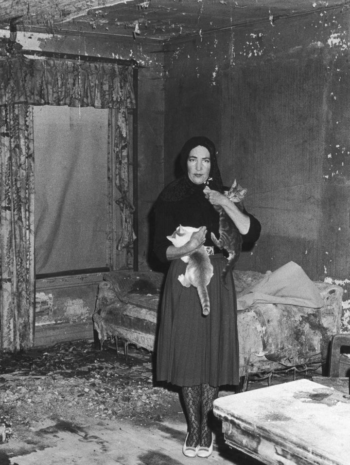 “Little Edie” and two of her cats, at Grey Gardens circa 1973.