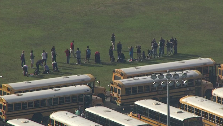 Students were evacuated from Santa Fe High School Friday morning. The high school serves about 1,500 students, according to statistics reported to the U.S. Department of Education.