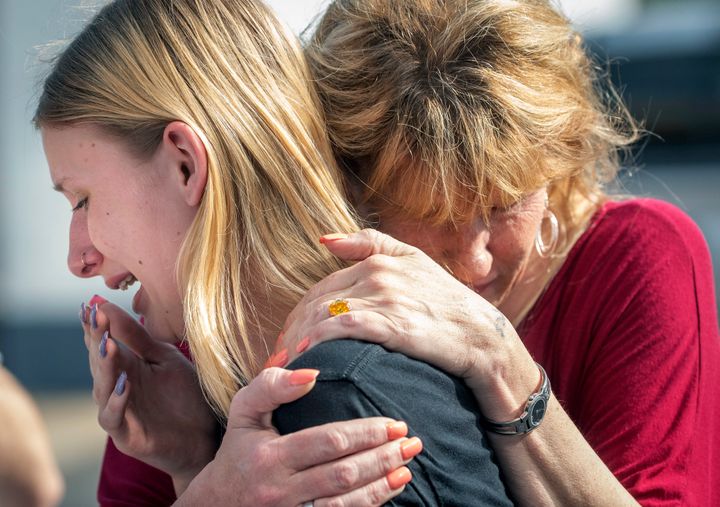 Santa Fe High School student Dakota Shrader is comforted by her mother, Susan Davidson, following the shooting at the school.