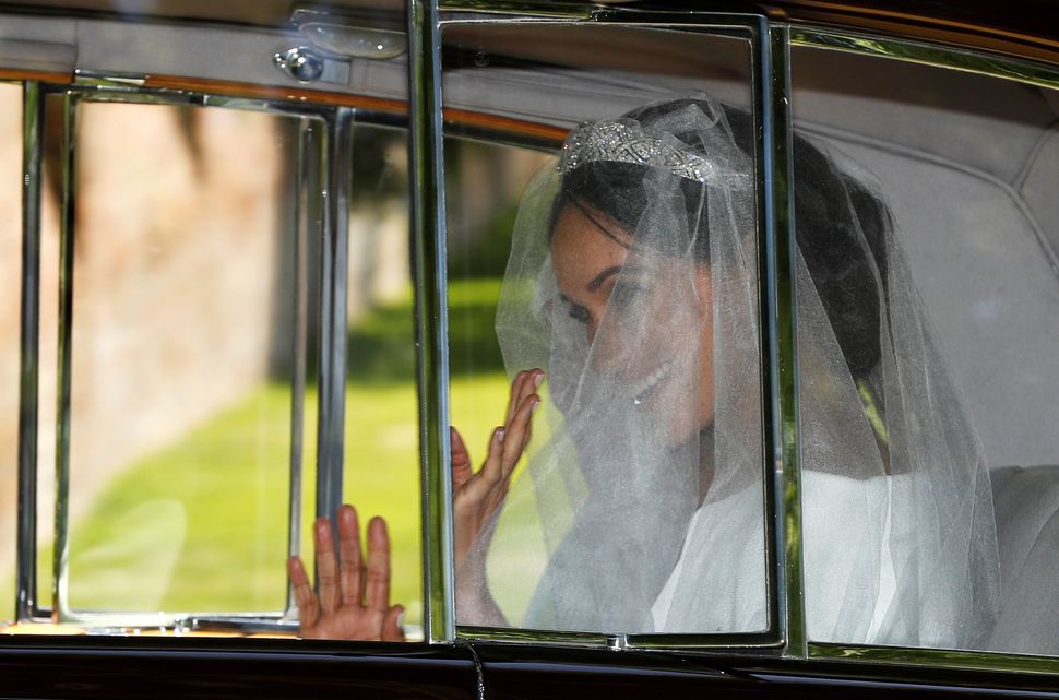 The bride-to-be was all smiles on her way to the altar 